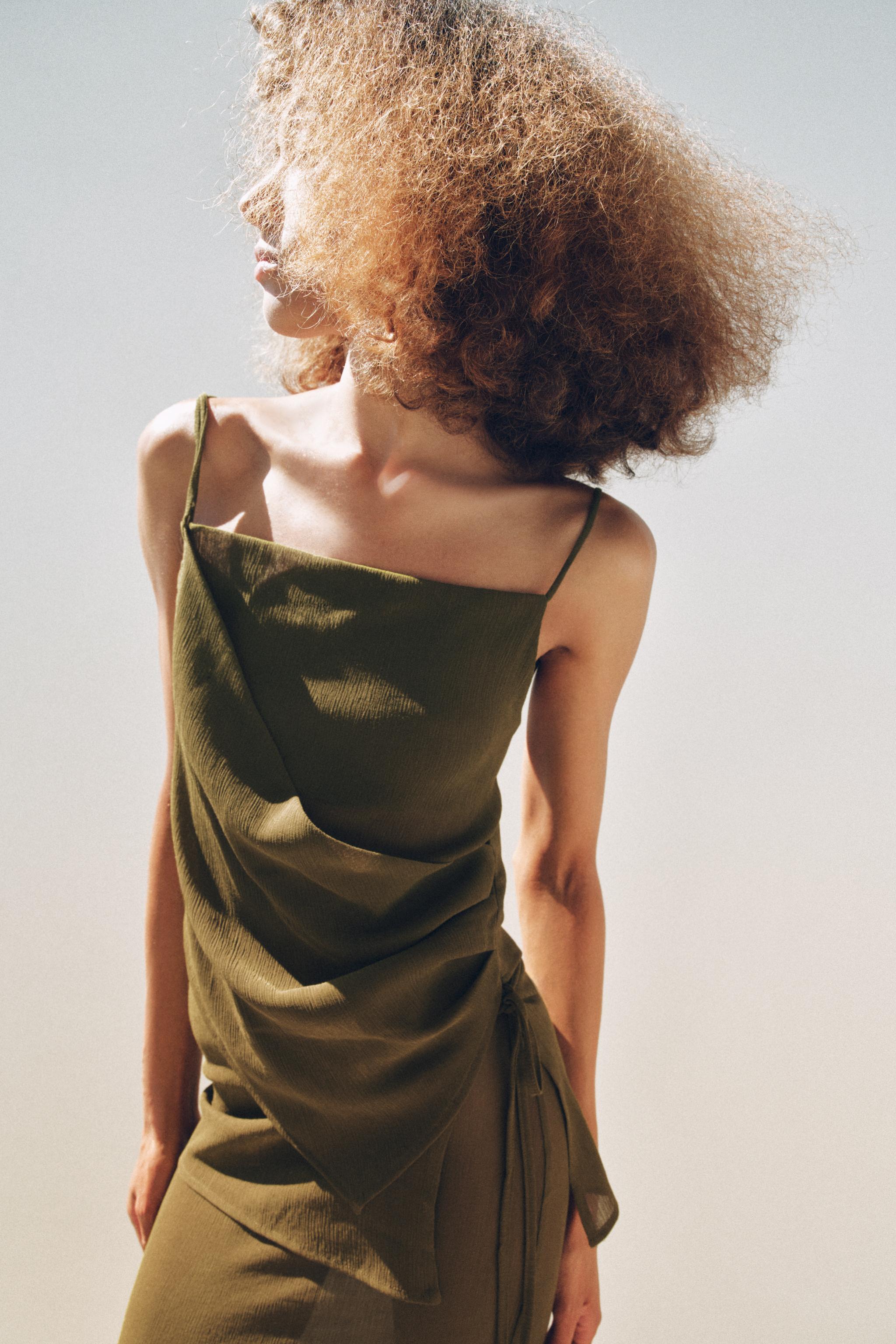 SEMI-SHEER TEXTURED ASYMMETRIC TOP